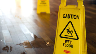 Never leave a wet floor unattended or unmarked
